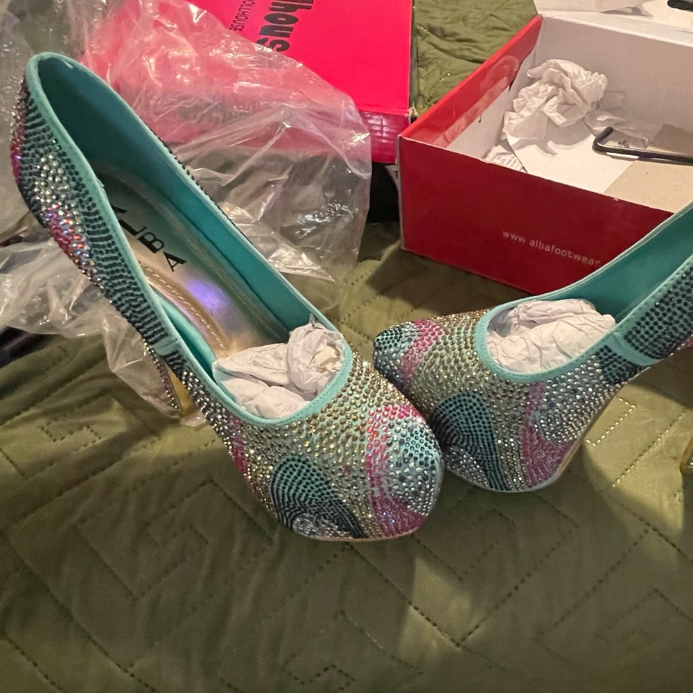 Never worn sparkly stilettos. Size 8.